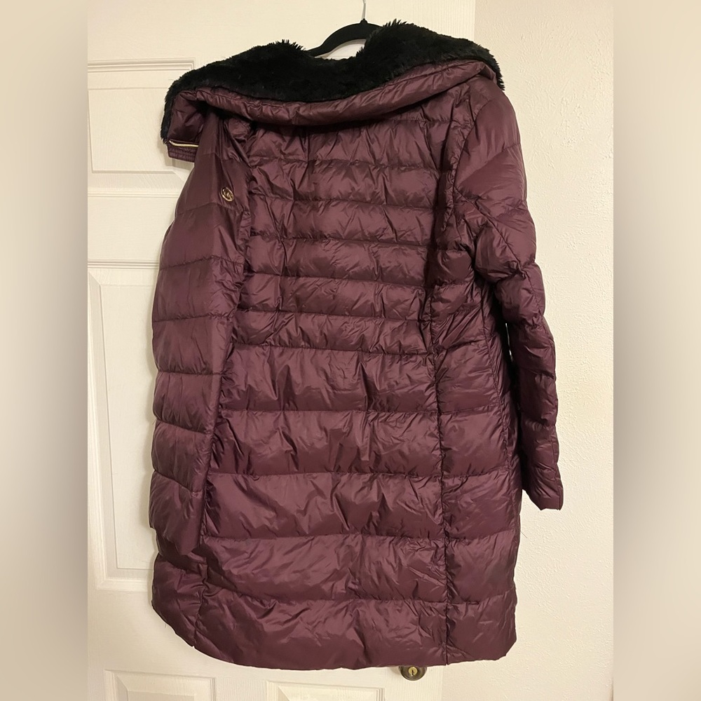 Large Micheal Kors down long coat. I worn it about ten times.